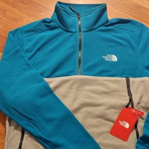 The North Face jacket (teal and grey)
